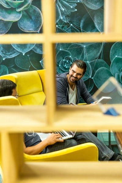 Man in office smiling